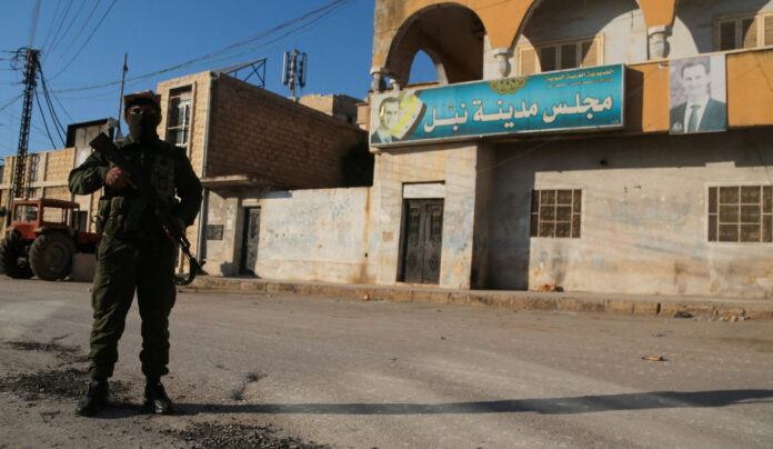 2024-12-02T190238Z_172750098_RC20HBADU0S1_RTRMADP_5_SYRIA-SECURITY-1